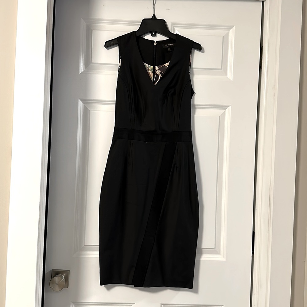 Ted Baker Black  midi dress , gently used twice and dry cleaned . Size 0 US